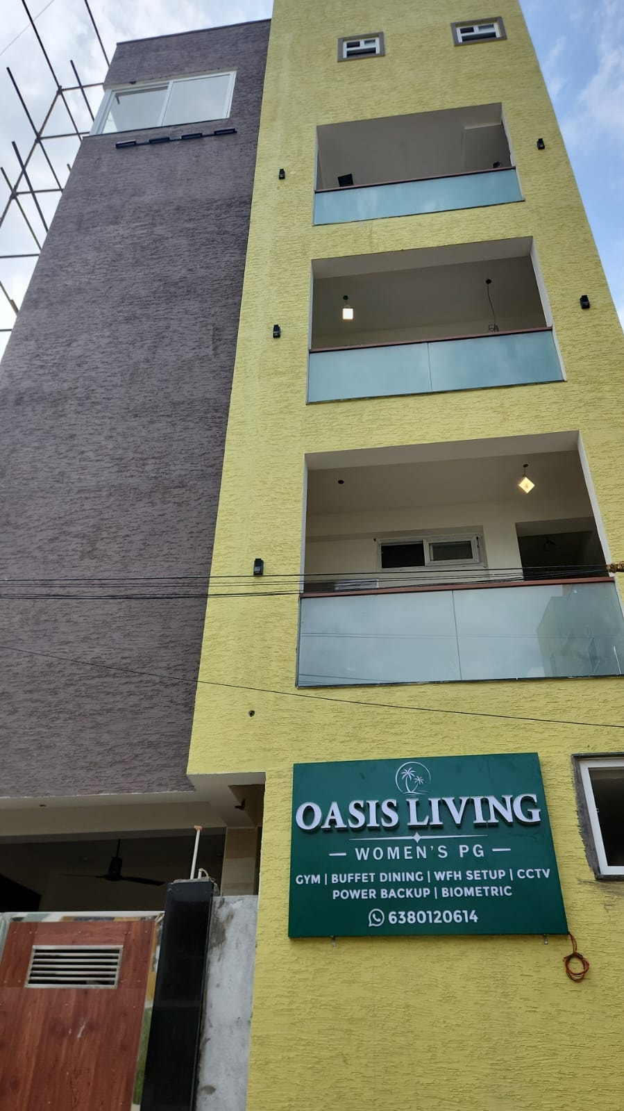 Building — Oasis Living exterior with signage