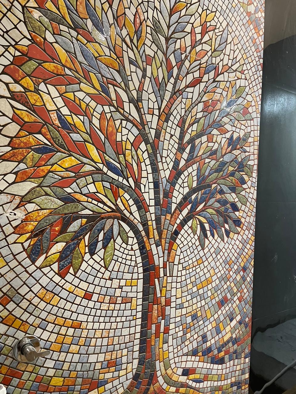 Building — mosaic tree artwork in common area