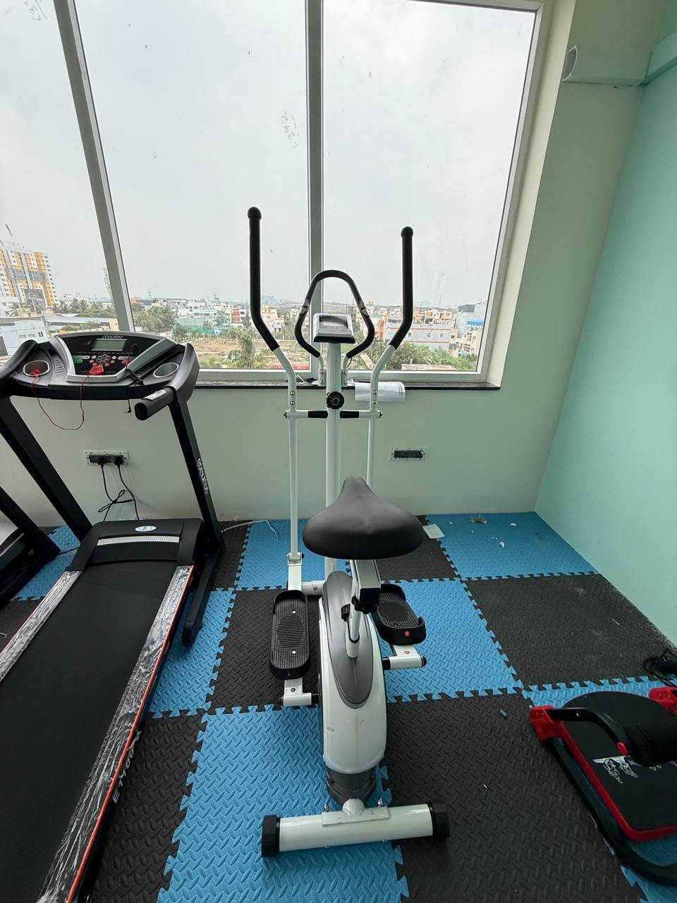 Oasis Living gym — workout bench and resistance equipment