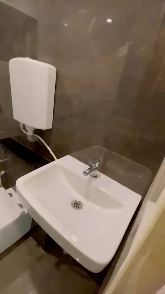 Double sharing — bathroom basin