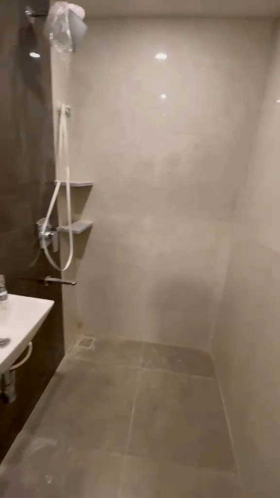 Triple sharing — shower area