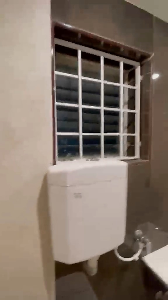 Triple sharing — bathroom toilet and window